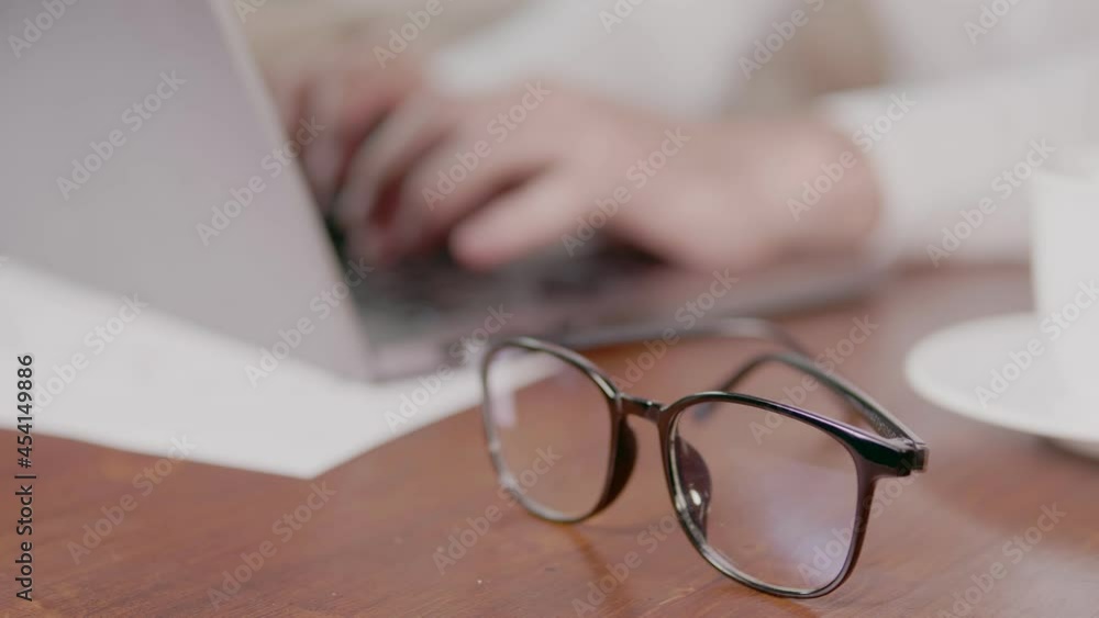 Businessman despairing while sitting at laptop Businessman despairing while sitting at laptop
