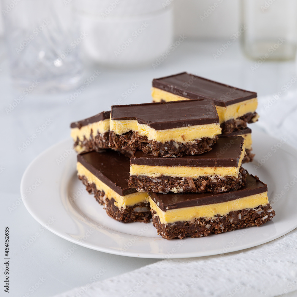 A small plate of Nanaimo bars - a traditional Canadian dessert A small plate of Nanaimo bars - a traditional Canadian dessert