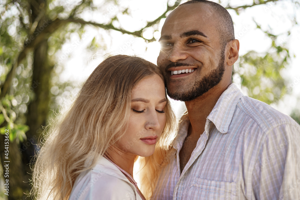 Close up of young couple in love enjoying time together outdoors Close up of young couple in love enjoying time together outdoors