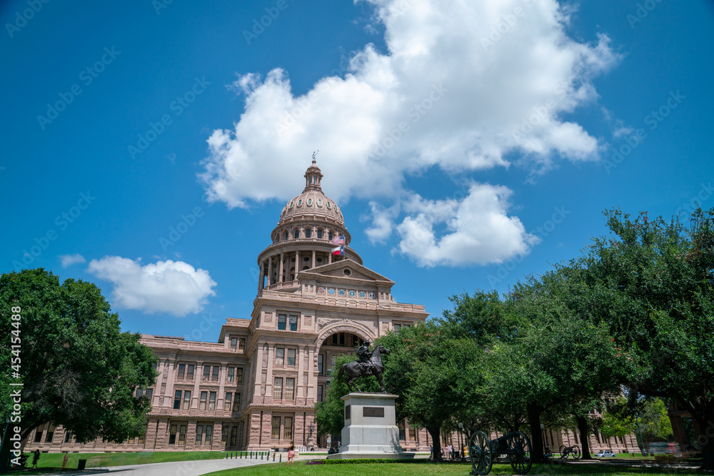 View of the Austin Texas State Capitol Building during the Day Time with Clouds in the Sky