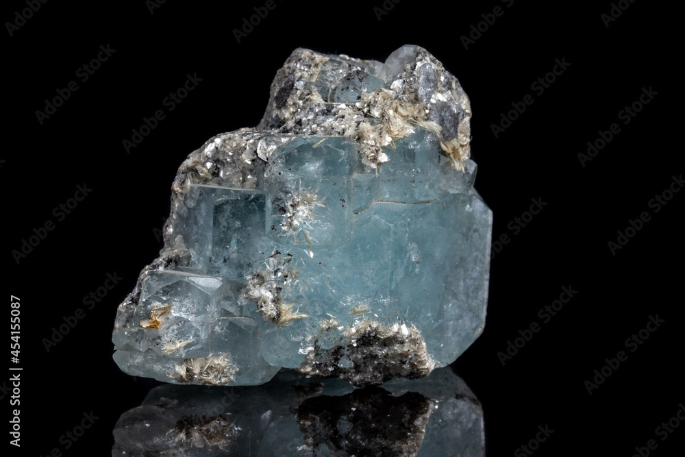 Macro mineral stone Aquamarine on a black background Macro mineral stone Aquamarine on a black background