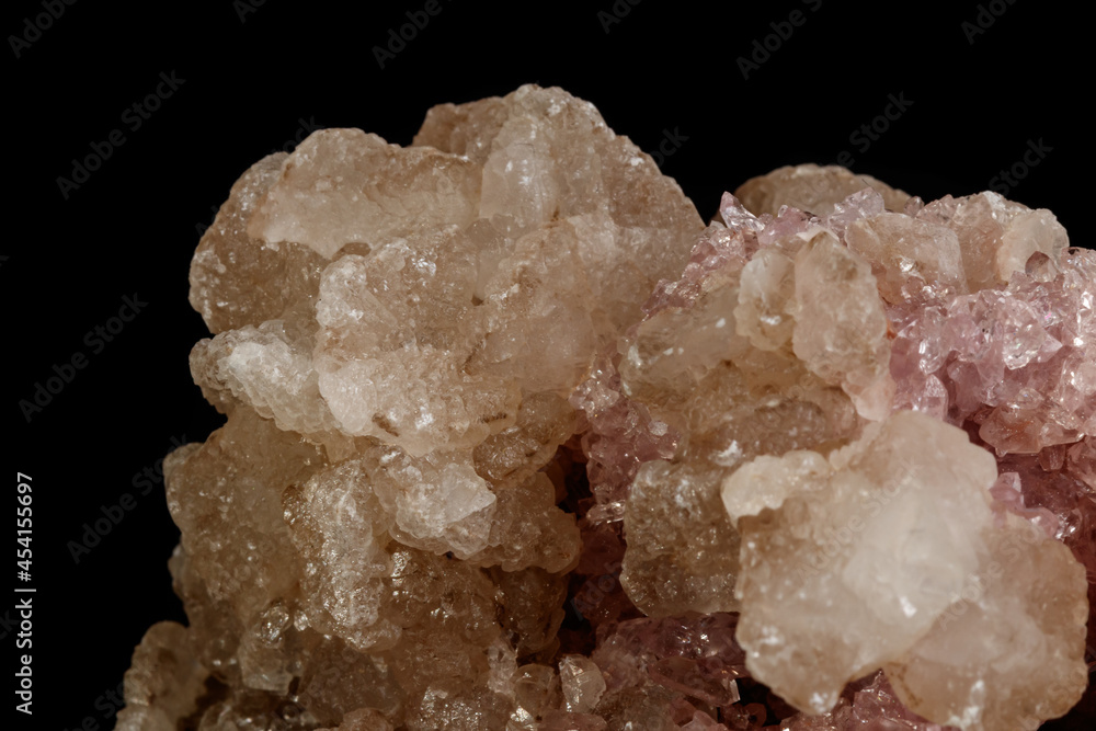 Macro mineral stone Pink Amethyst on a black background Macro mineral stone Pink Amethyst on a black background