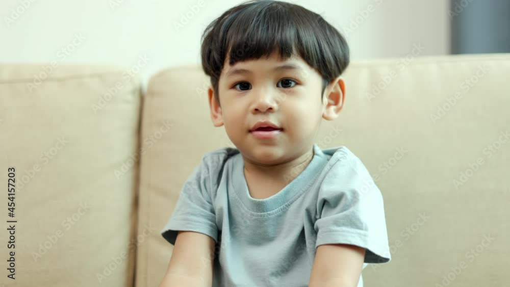 Asian little boy playing colorful ball in the living room. Sitting on sofa in the house. Developing children's learning before entering kindergarten Practice the skills.
Asian little boy playing colorful ball in the living room. Sitting on sofa in the house. Developing children's learning before entering kindergarten Practice the skills.