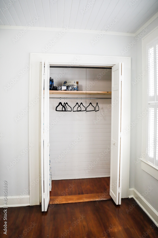 Empty Closet With Hangers