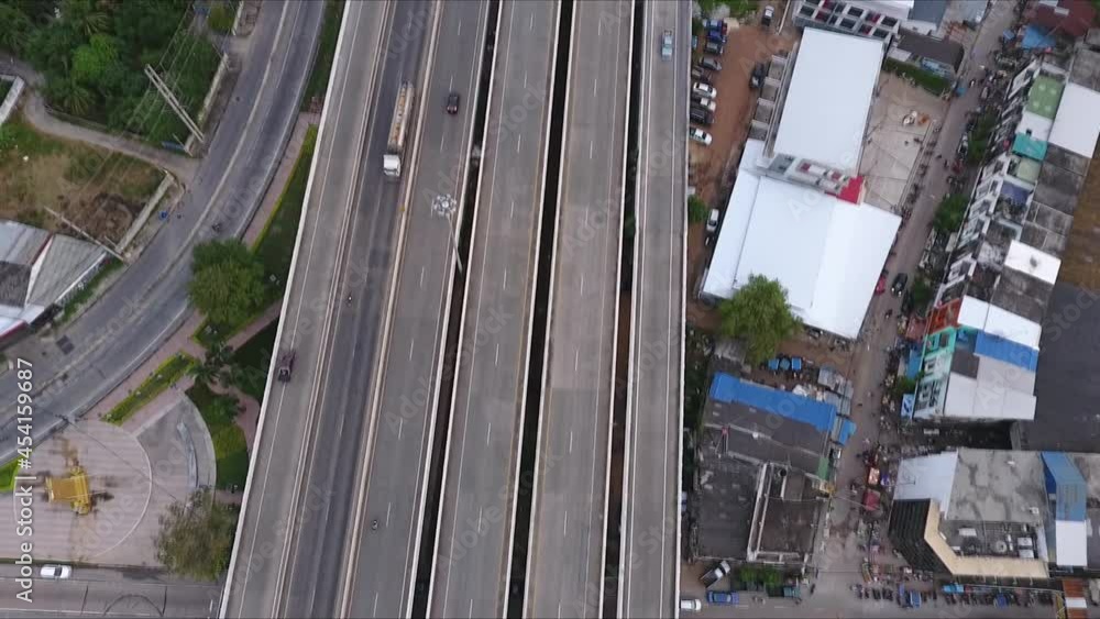 Aerial view, top down view of car traffic transportation on highway road. Public transport, commuter lifestyle, Asian city life. Aerial view, top down view of car traffic transportation on highway road. Public transport, commuter lifestyle, Asian city life.