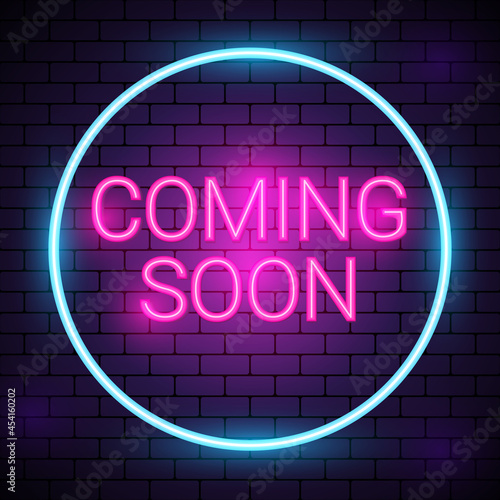 Neon coming soon on brickwall background.