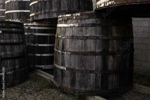 Old rusty wooden barrels