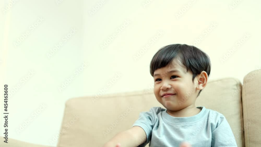 Asian boy folds a paper plane to fly. play at home in the living room. Developing children's learning before entering kindergarten Practice the skills.
Asian boy folds a paper plane to fly. play at home in the living room. Developing children's learning before entering kindergarten Practice the skills.