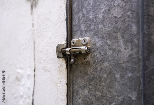 Wallpaper Mural Metal bolt on an old door Torontodigital.ca