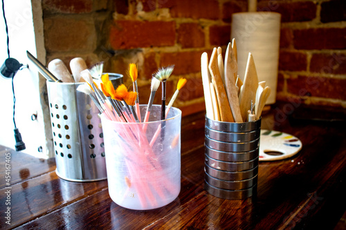 brushes and other accessories for modeling from clay  for creativity in a pottery workshop with your own hands