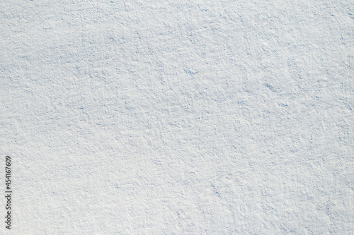 The texture of the field covered with snow. Aerial view