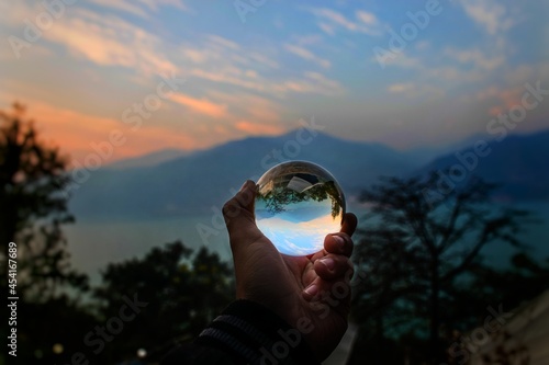 person holding a telescope