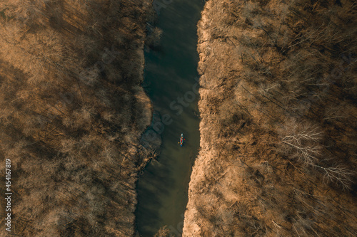 Colorful kayaks float on the river