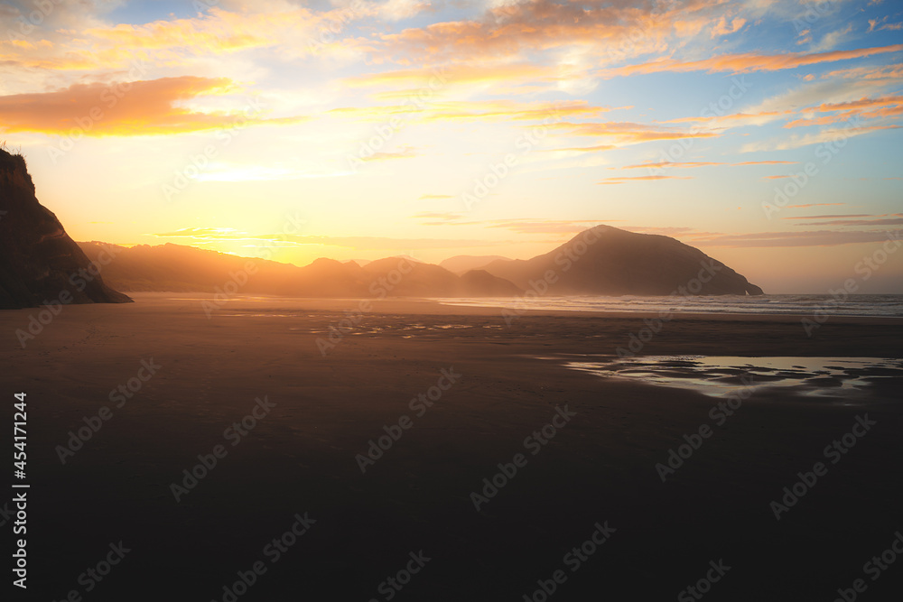 Sunrise at Wharariki beach, New Zealand