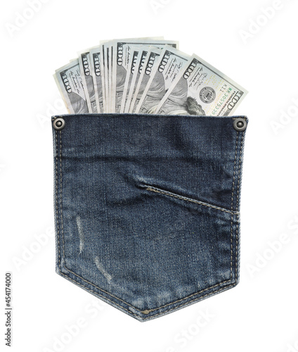 Jeans pocket and dollar banknotes isolated on white. Spending money