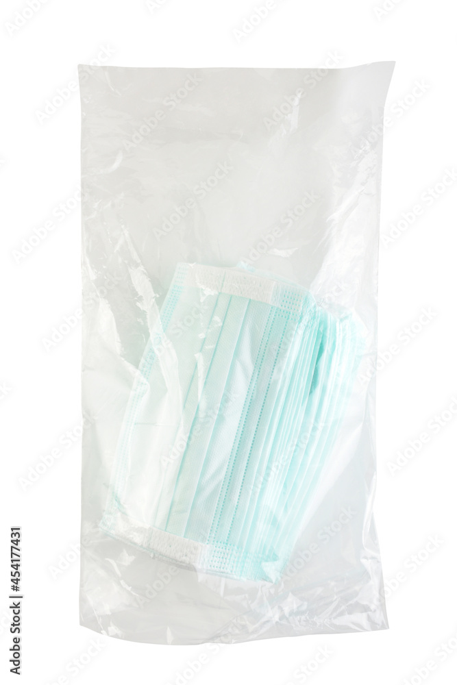 A plastic package of protective face masks on the white background with clipping path A plastic package of protective face masks on the white background with clipping path