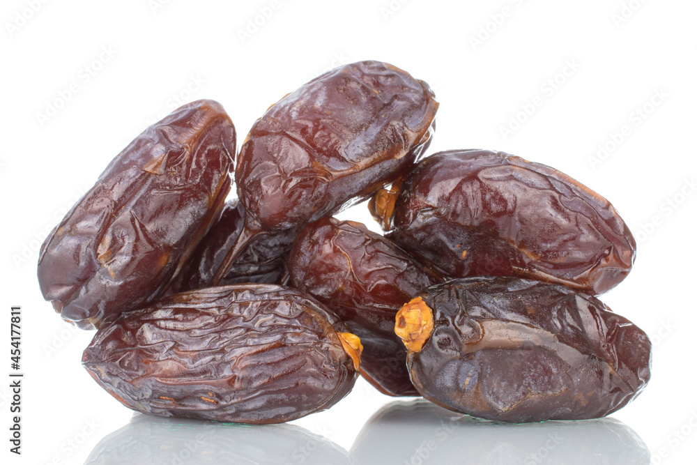 Several royal dates, close-up, isolated on white. Several royal dates, close-up, isolated on white.