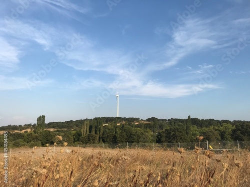 wind mills with couldy sky photo