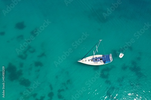 aerial view of sailing boat on sea © Hayriye