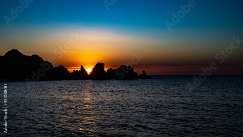 sunset view to the sea with coastline. Sardinia  Italy.