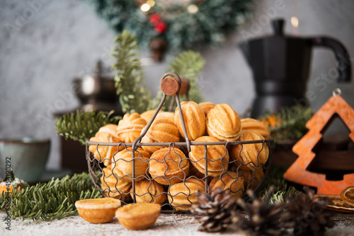 Christmas sweets cookies nuts with condensed milk on the festive table, Christmas decorations photo