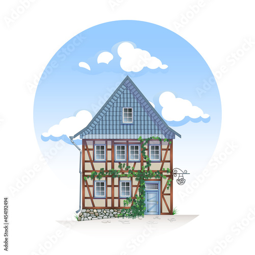 Colored half-timbered house against the blue sky