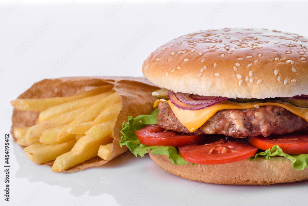 Craft beef burger and french fries on a white background Craft beef burger and french fries on a white background
