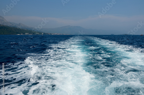 Croatia, Peljesac Peninsula. Traveling by ferry from Orebic to Korcula Island. Foamed water behind the ferry.