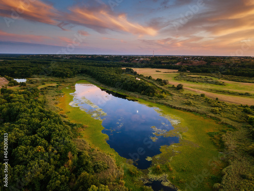 Natural landscape. Lake at the sunset, aerial view