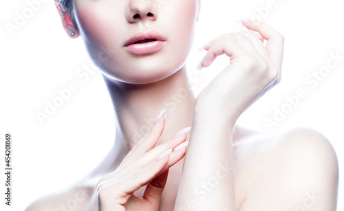 Lips, beauty face, hands, neck, shoulders of young model woman with healthy skin apply cream cosmetics. Skincare facial treatment health concept