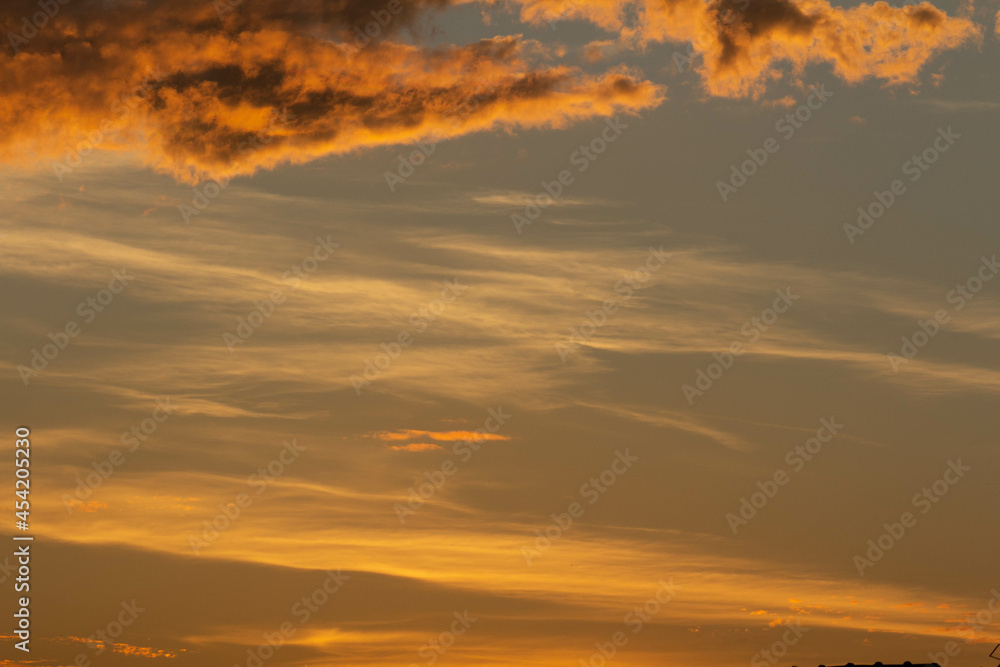 Beautiful orange sunset with clouds.