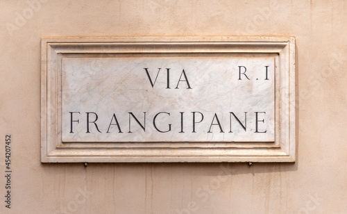 marble plate with Street name via Frangipane - engl: almond paste street - at the wall in Rome