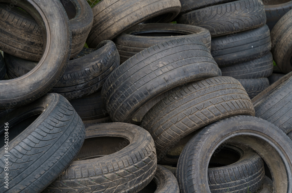 Dump of old car tires, texture. Close-up Dump of old car tires, texture. Close-up