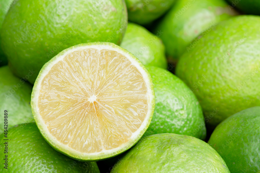 Lime slice citrus fruits background. Fresh juicy limes. Healthy food. Lime slice citrus fruits background. Fresh juicy limes. Healthy food.