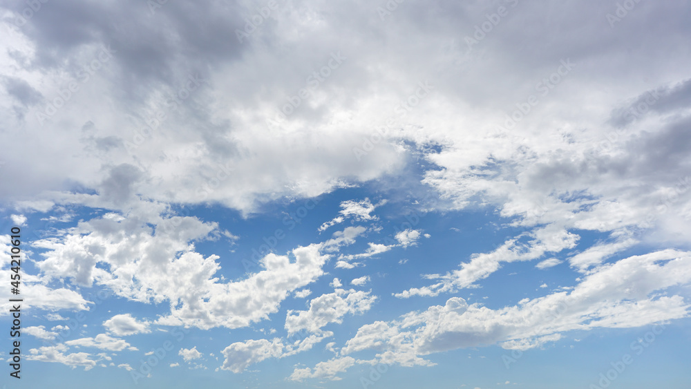 White clouds and blue sky suitable for background or subsitution White clouds and blue sky suitable for background or subsitution