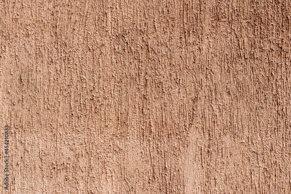 Pattern of beige decorative and textured plaster. Background and texture for design and decoration. Pattern of beige decorative and textured plaster. Background and texture for design and decoration.