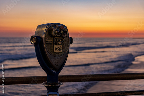 binoculars at sunset