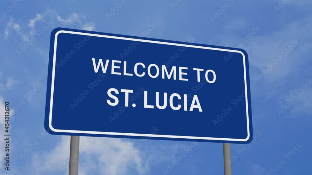 Welcome to St. Lucia Road Sign on Clear Blue Sky with Rapid Moving Clouds Welcome to St. Lucia Road Sign on Clear Blue Sky with Rapid Moving Clouds