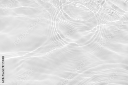 Water texture overlay effect for photo and mockup. Organic shadow caustic effect with wave refraction of light toned in white or light gray.