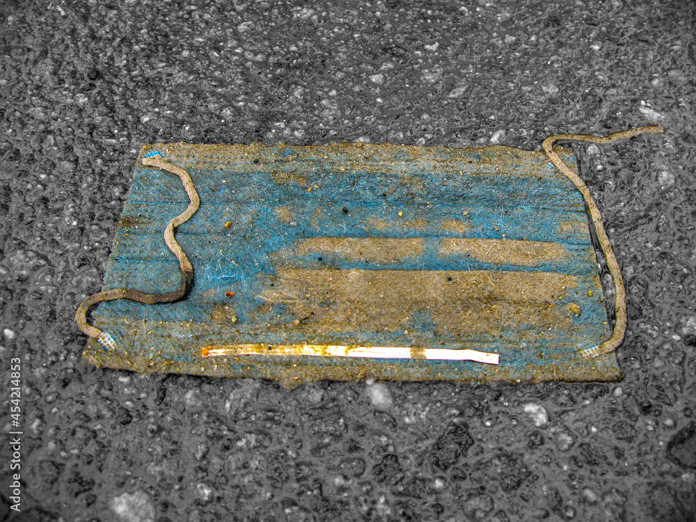 Fototapeta premium Medical mask on the ground