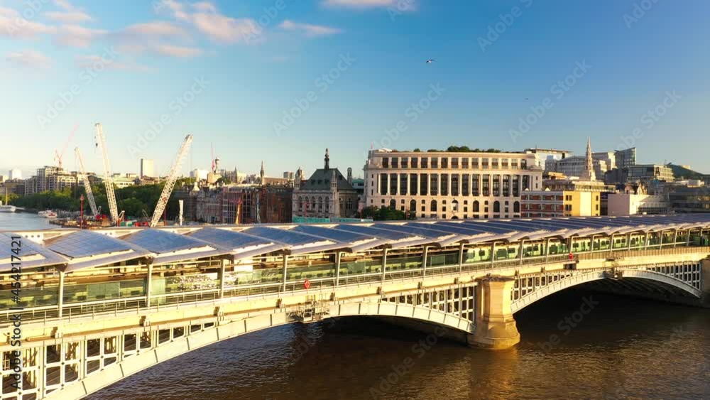 Train Approaching Train Station Located On Roofed Blackfriars Railway Bridge Train Approaching Train Station Located On Roofed Blackfriars Railway Bridge