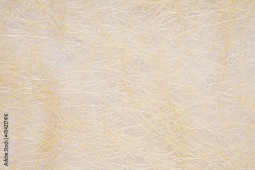 Coconut fiber paper background texture, dyed yellow.