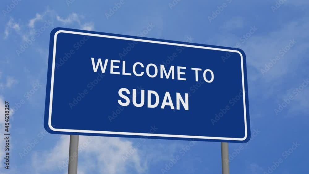 Welcome to Sudan Road Sign on Clear Blue Sky with Rapid Moving Clouds Welcome to Sudan Road Sign on Clear Blue Sky with Rapid Moving Clouds
