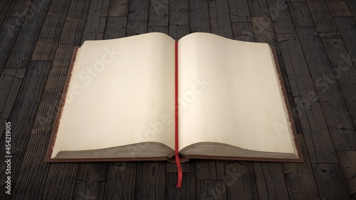 Old blank open hardcover book on wooden background.  photo