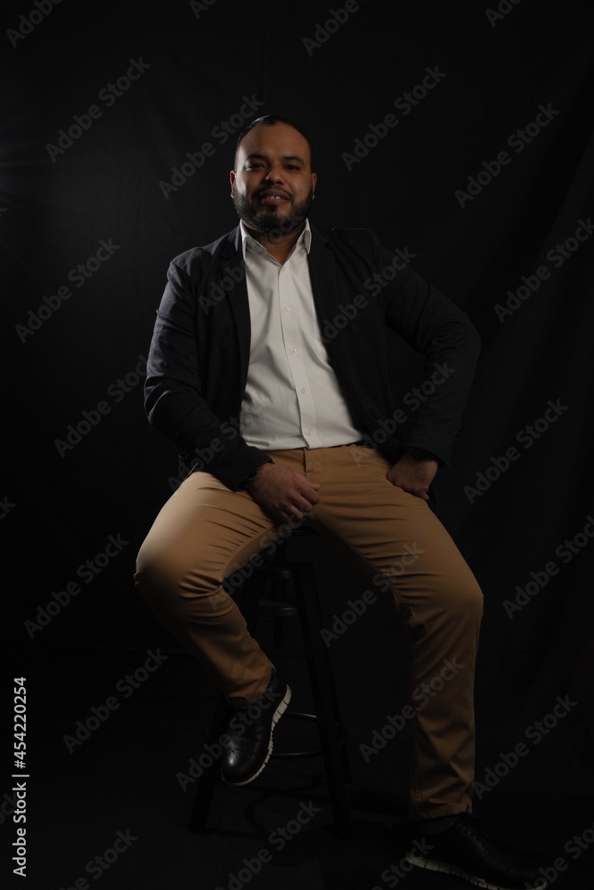 Fototapeta premium portrait of a man on chair