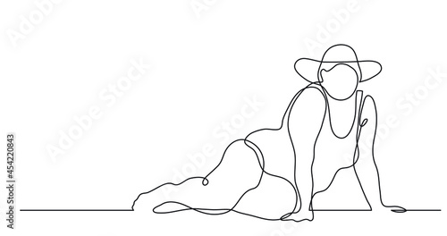 continuous line drawing of confident oversize woman lying on beach celebrating body positivity