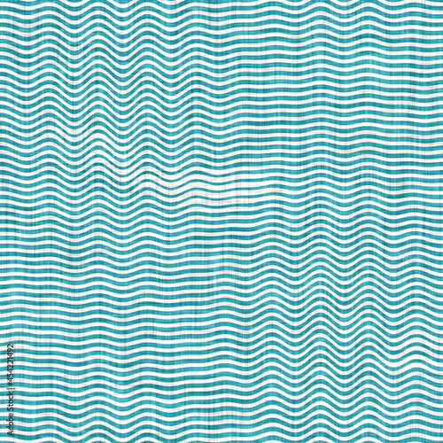 Aegean teal mottled linen nautical texture background. Summer coastal living style home decor. Worn turquoise blue dyed textile seamless pattern.