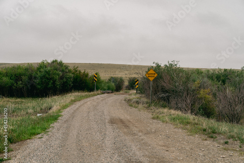 Rough dirt road leading to a campground in the Blacktail Wildlife Management area public land in Montana photo