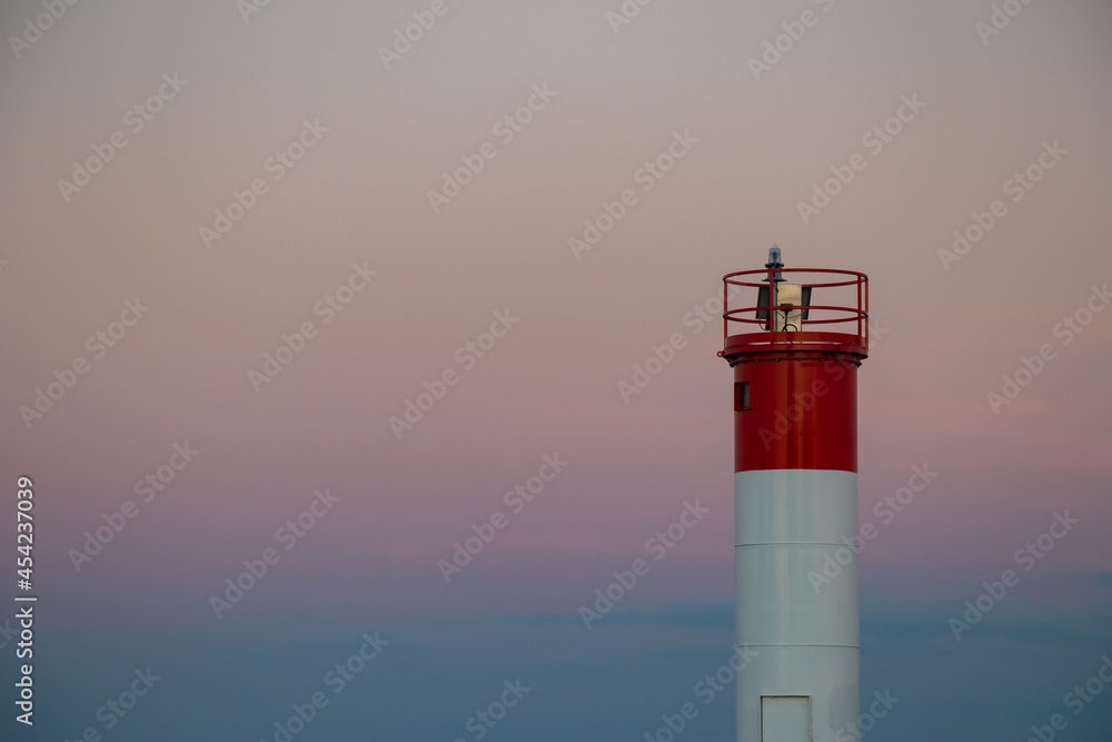 Lighthouse beacon on the coastal shores of lake ontario