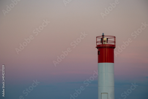 Lighthouse beacon on the coastal shores of lake ontario